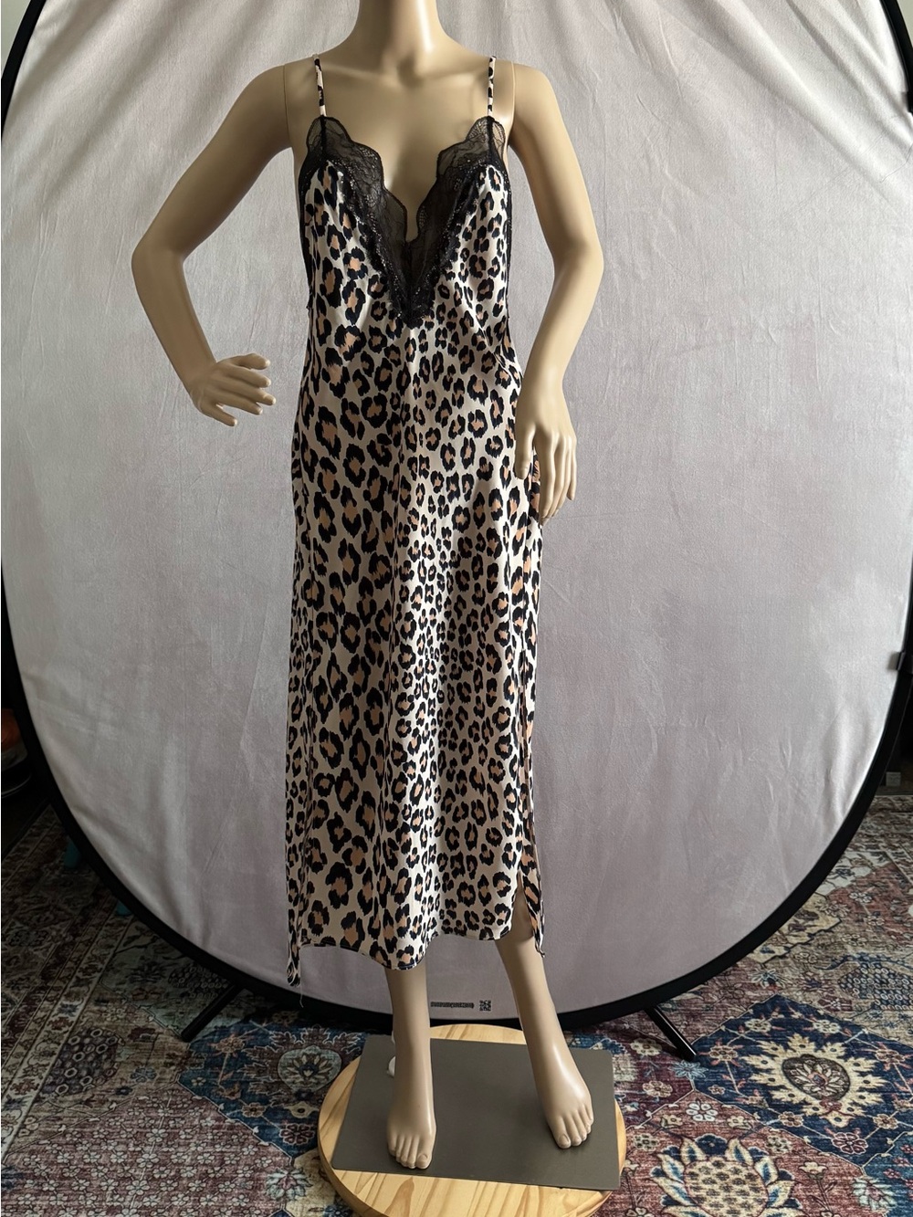 Victoria's Secret Leopard Satin Slip with Black Lace. It’s a lingerie.